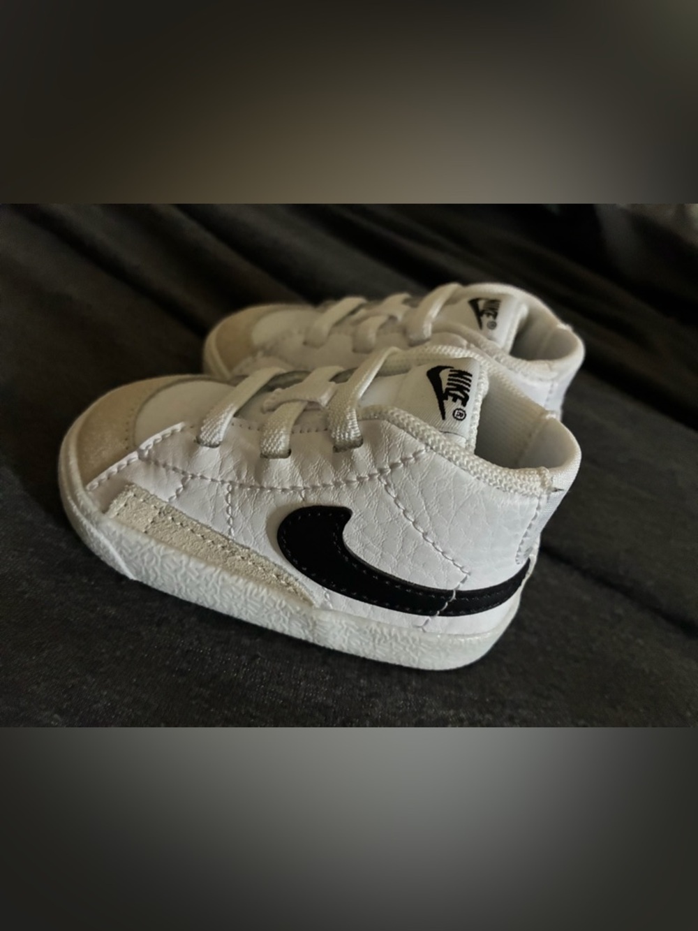 Like-New Nike Kids White Sneakers with Black Swoosh